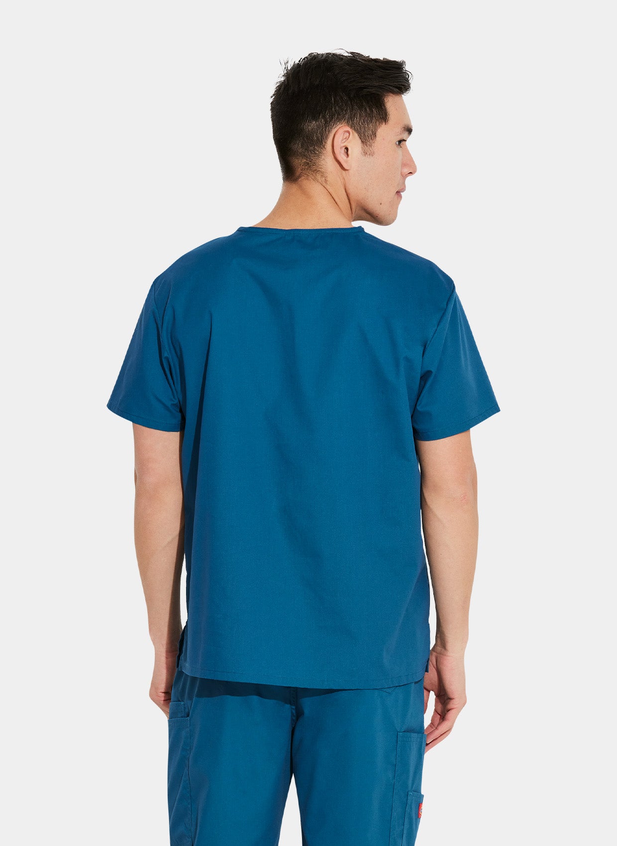 Blouse médicale unisexe Dickies EDS col en V bleu caraibes dos